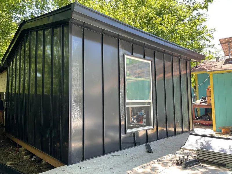 Black standing seam metal wall panels for Roof Inspection in Carl Junction