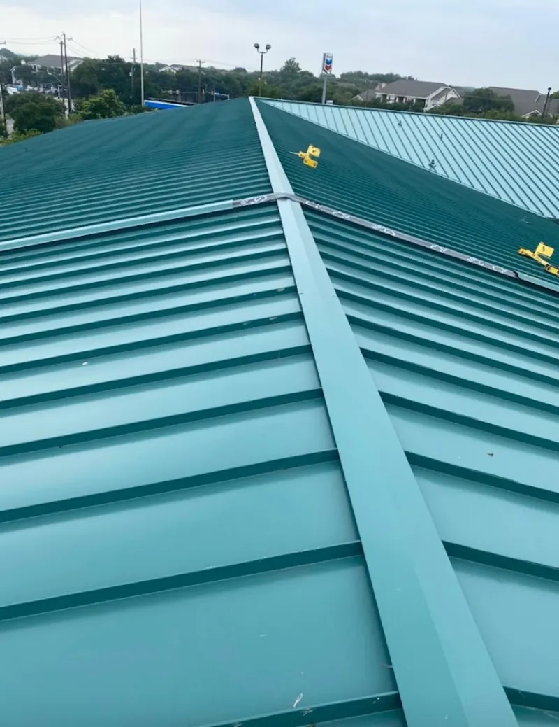 Green commercial metal roof ridge and valley for Metal Roof Repair in Carl Junction