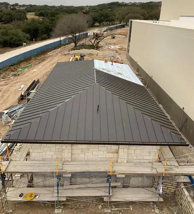 Metal roof new construction with scaffolding in Carl Junction