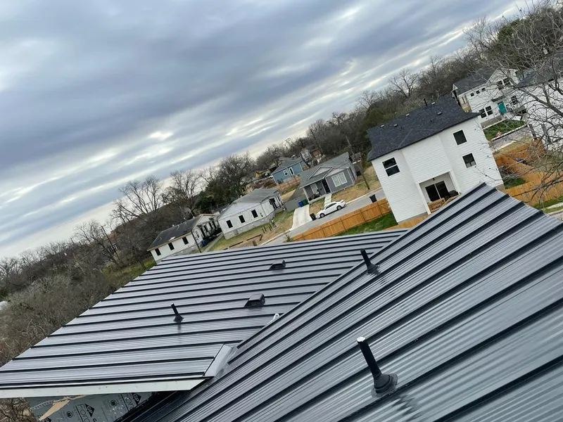 Standing seam metal roof panels with vents for Skylight Repair in Carl Junction